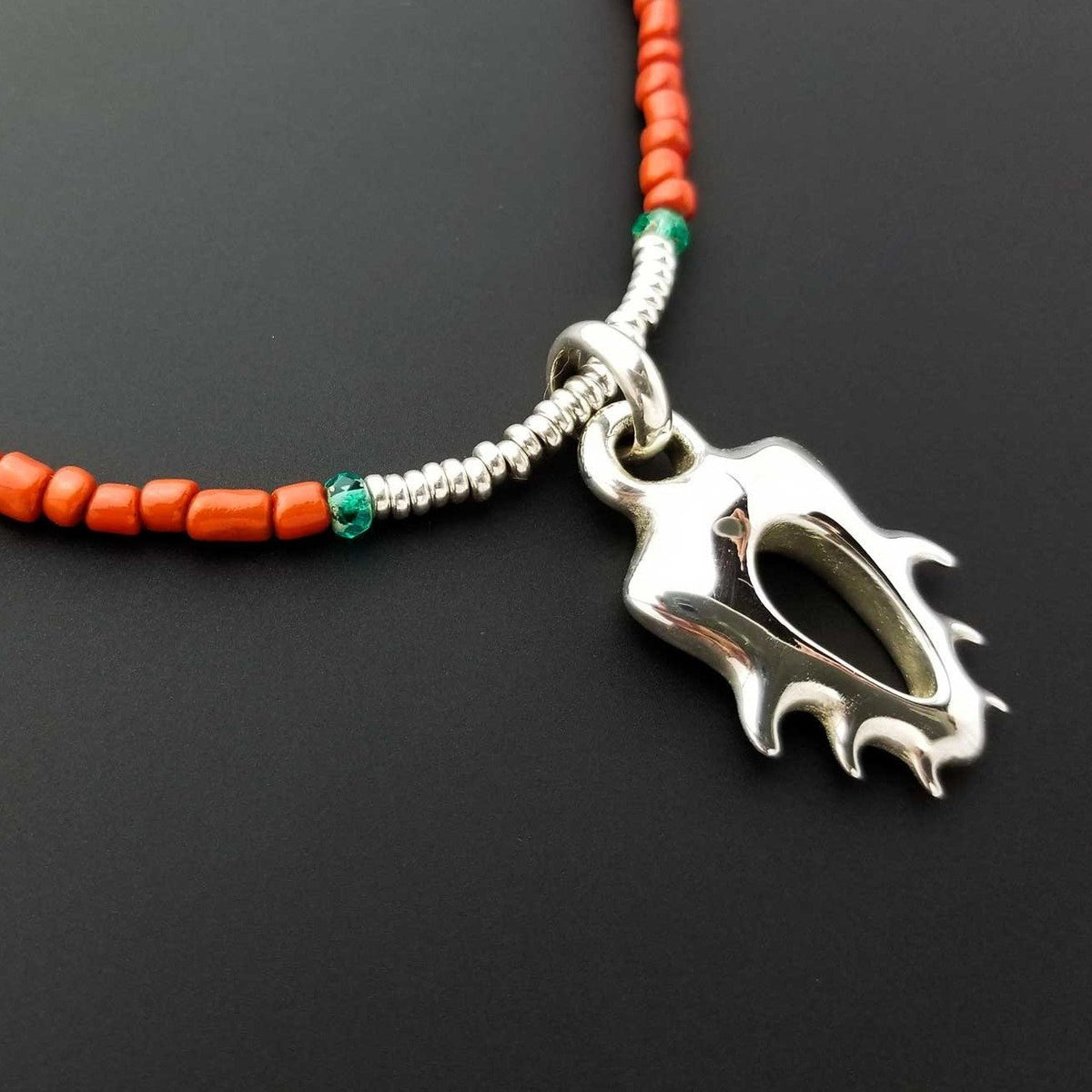 alien creature silver pendant