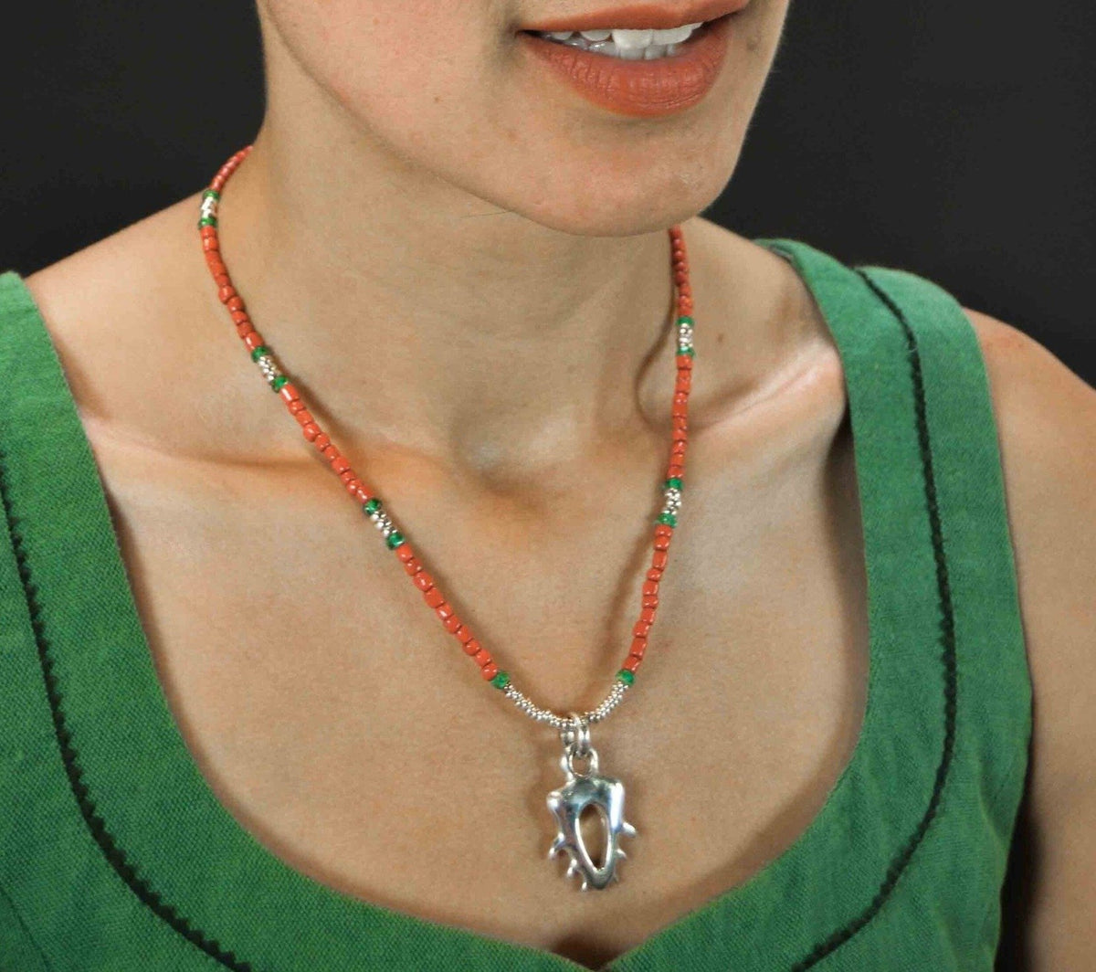 red and green silver necklace
