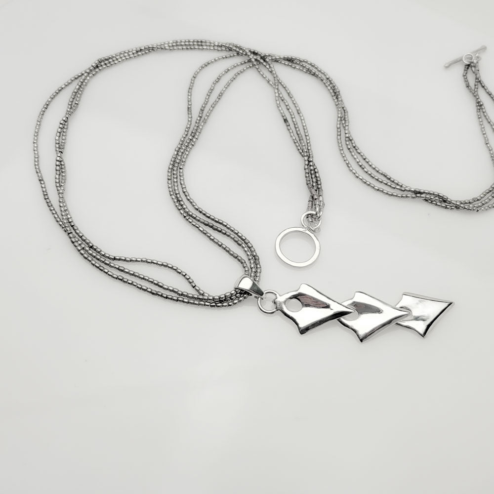 Unleash Your Inner Warrior with our Silver Arrowhead Triple Pendant Tribal Charm Necklace