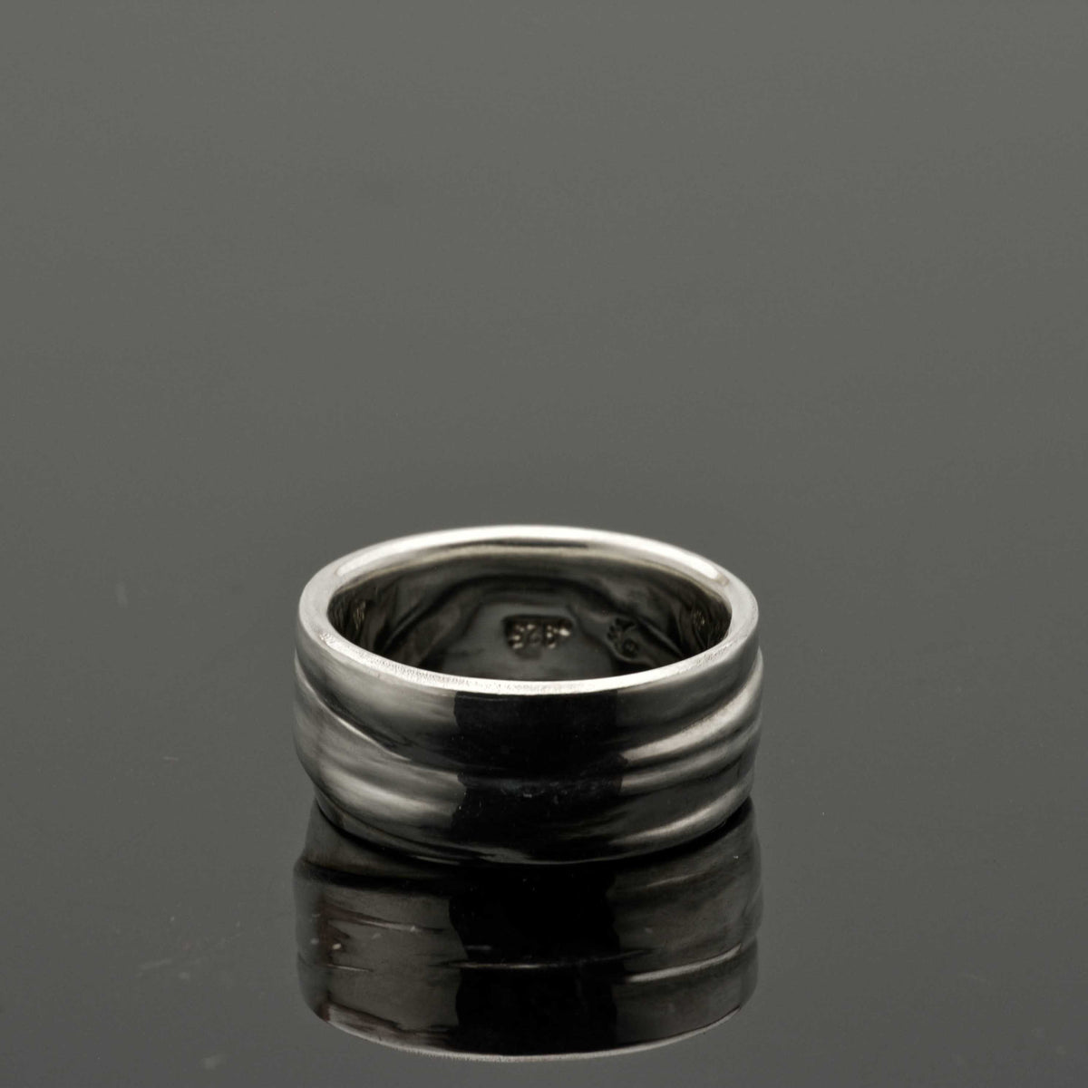 Home made silver ring with a artistic pattern