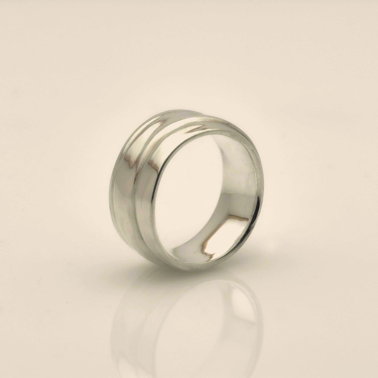 "Wavy Elegance: Sterling Silver Band with a Stunning Pattern Design" - Nine Amulets 