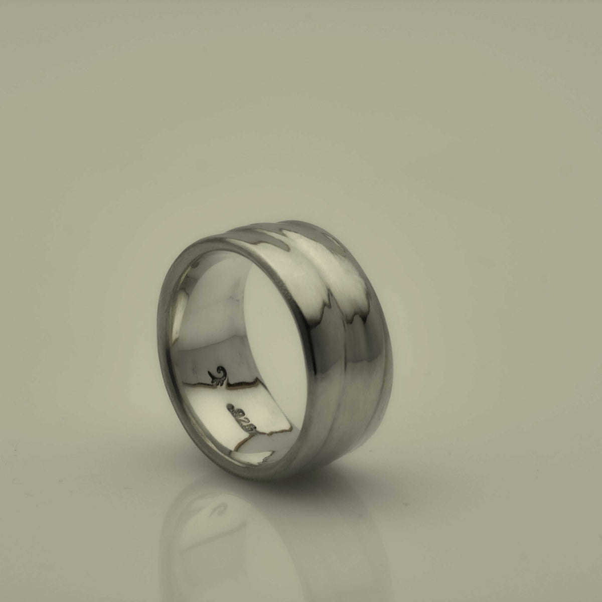 Home made silver ring with a artistic pattern