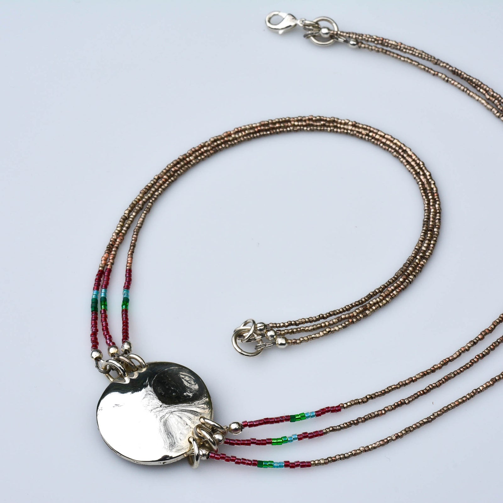 Three-Strand Tourmaline Necklace with Silver Medallion - Nine Amulets 