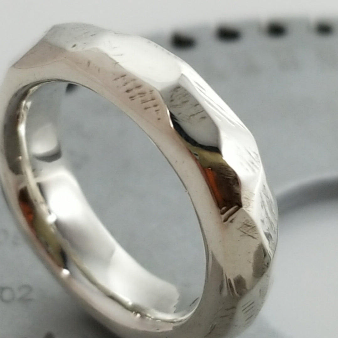 Discover Mr. Edgy: A One-of-a-Kind Solid Silver Ring with a Faceted Surface and Artistic Design - Nine Amulets 