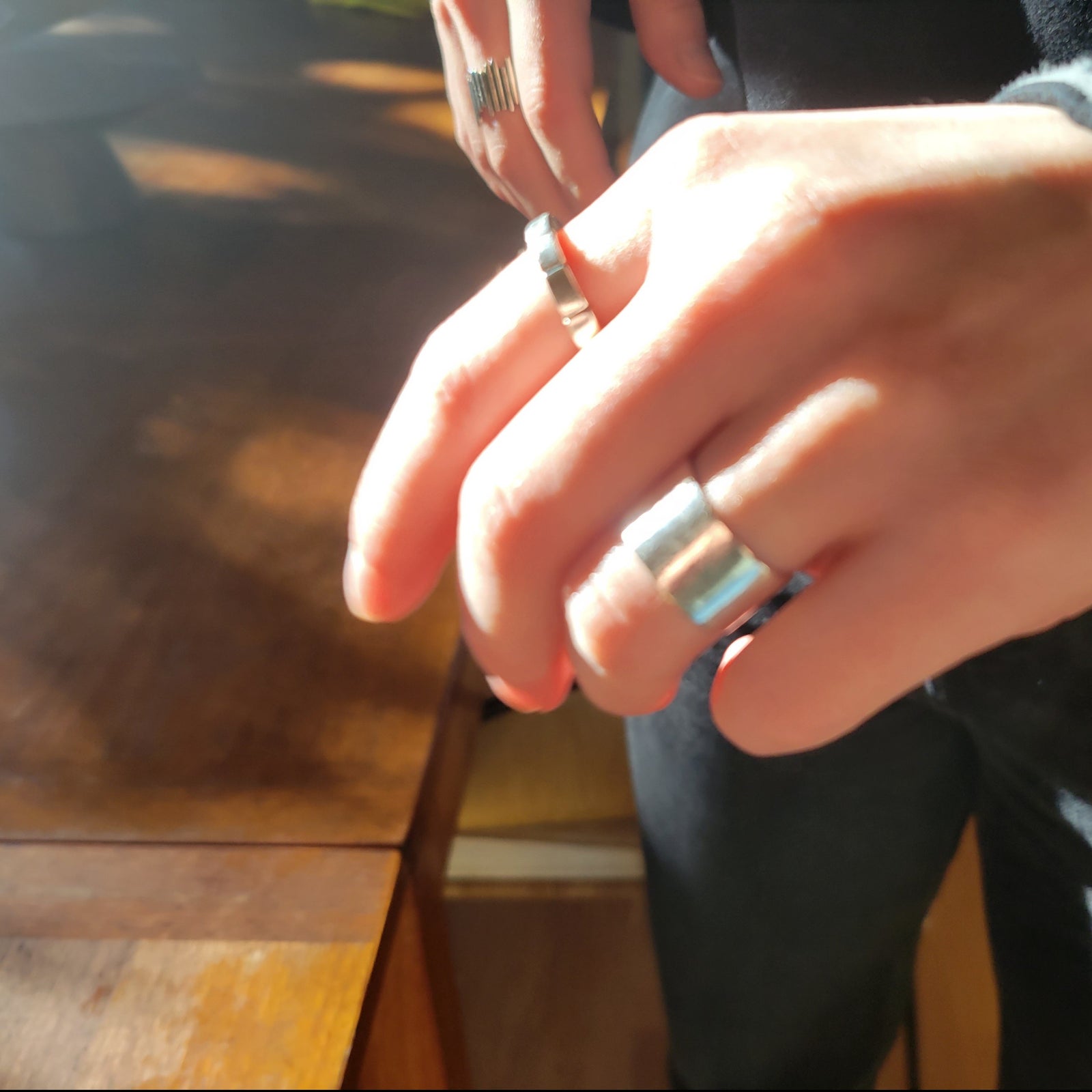 "Echoes of Elegance: The Artisanal Sterling Silver Tube Ring - An Unparalleled Blend of Style, Substance, and Svelte Craftsmanship" - Nine Amulets 