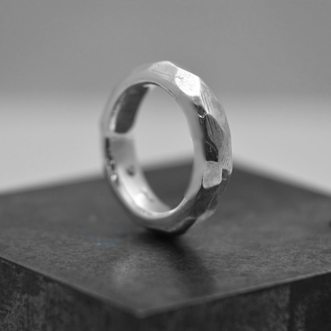 Discover Mr. Edgy: A One-of-a-Kind Solid Silver Ring with a Faceted Surface and Artistic Design