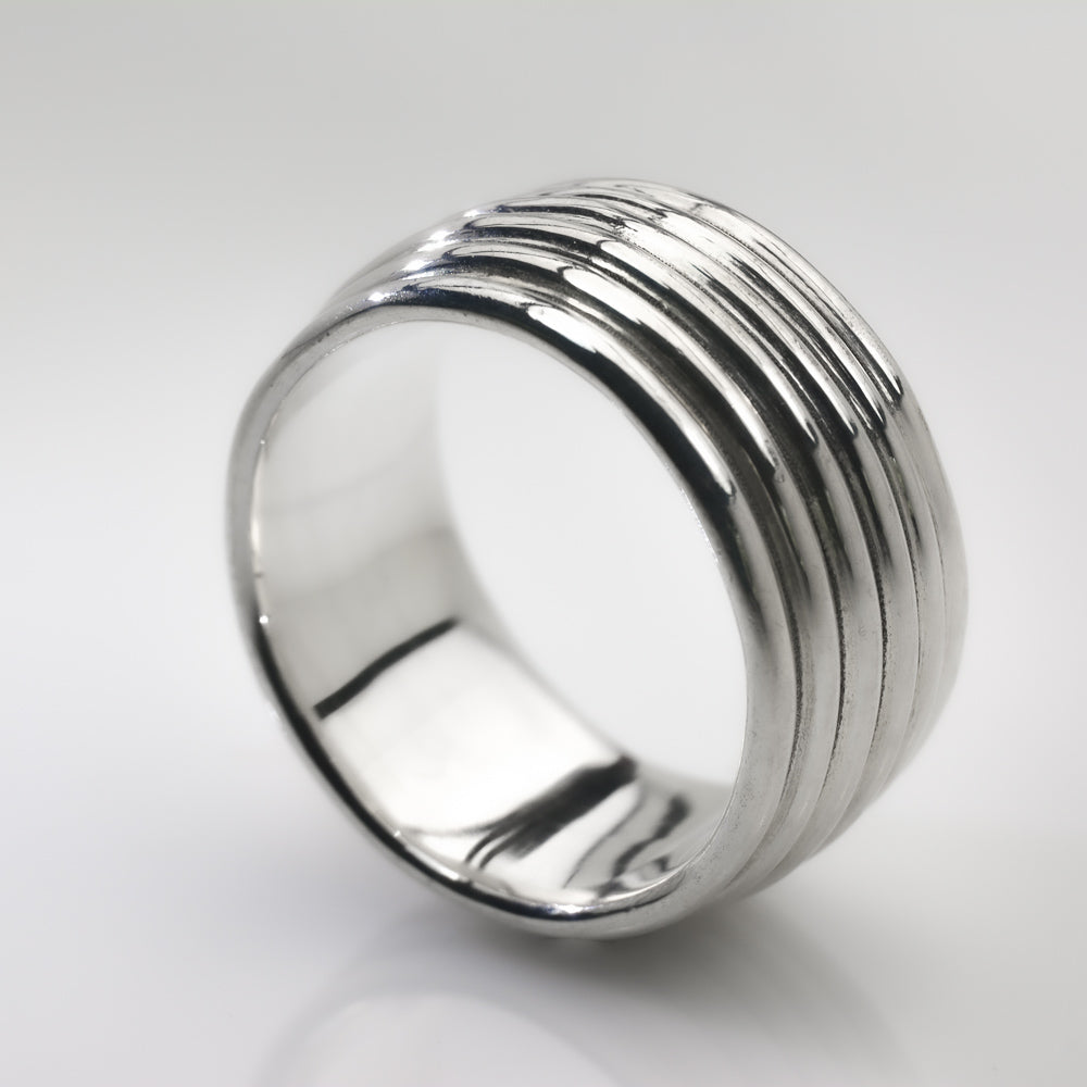 Revolutions: A Bold and Elegant Sterling Silver Ring with Six Loops - Nine Amulets 