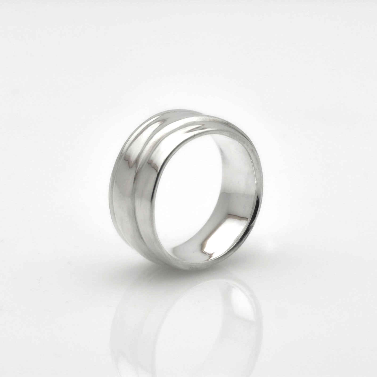 "Wavy Elegance: Sterling Silver Band with a Stunning Pattern Design" - Nine Amulets 
