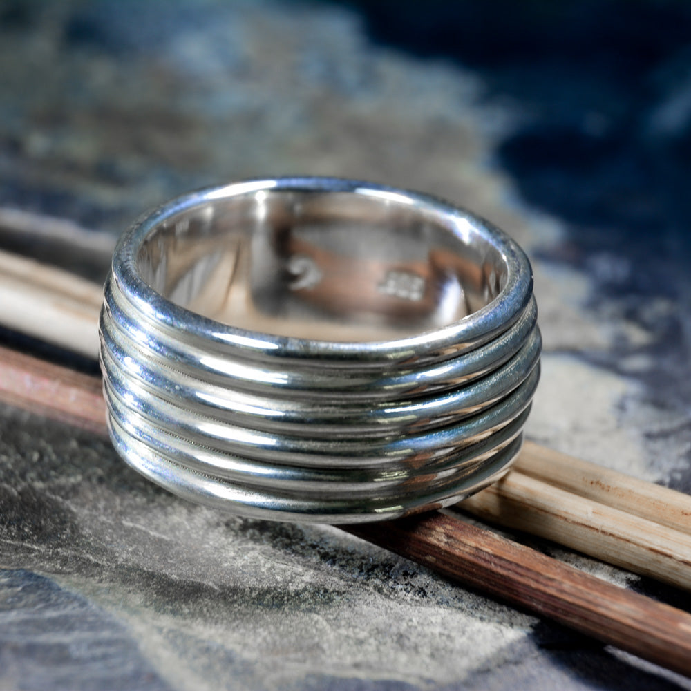 Revolutions: A Bold and Elegant Sterling Silver Ring with Six Loops - Nine Amulets 