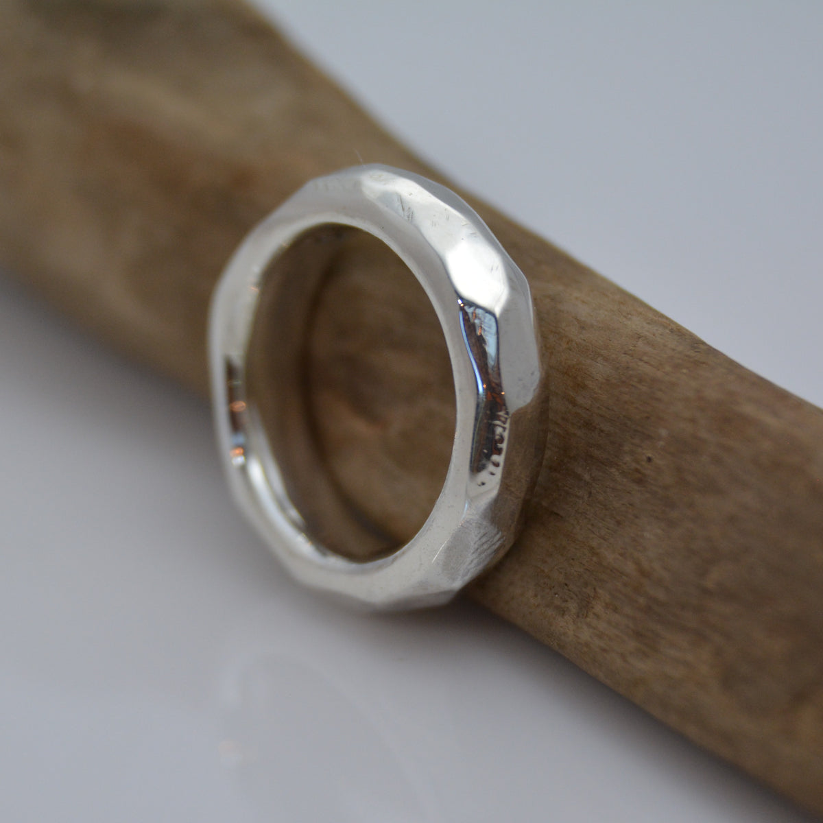 Discover Mr. Edgy: A One-of-a-Kind Solid Silver Ring with a Faceted Surface and Artistic Design - Nine Amulets 