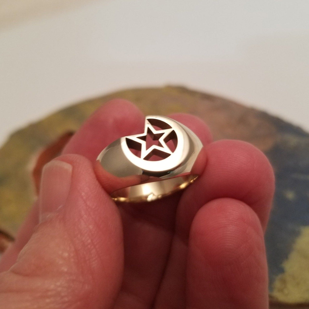 golden brass color star and moon ring