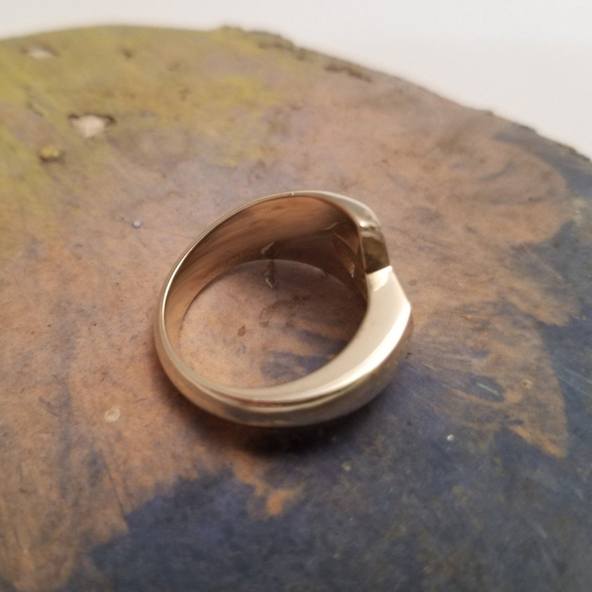 Side view of star and moon ring