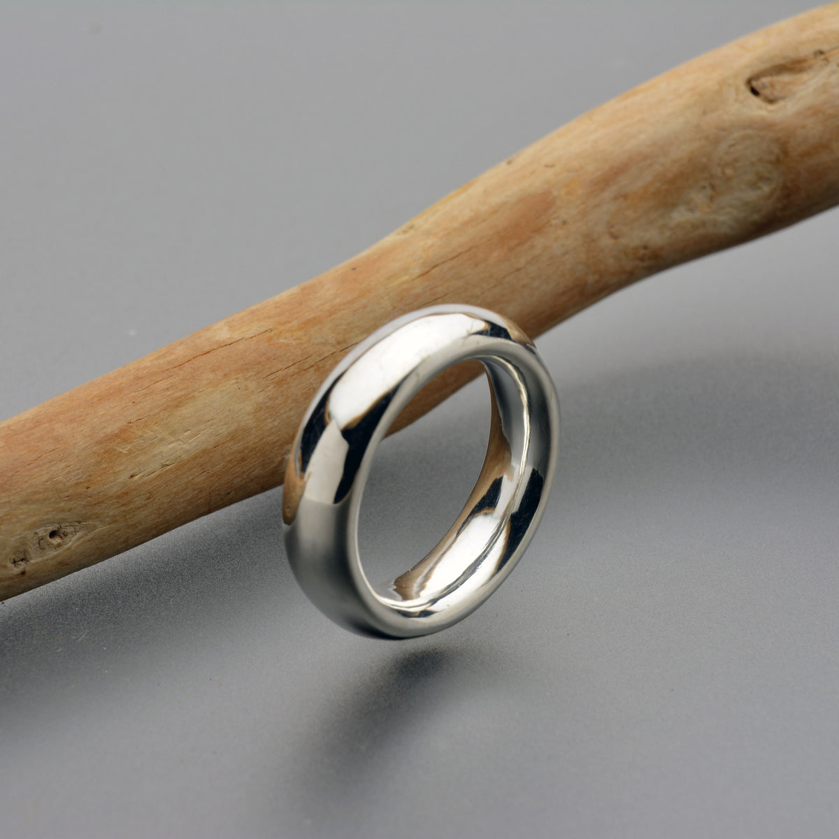 Fat moon sterling silver ring is a thick doughnut shape 