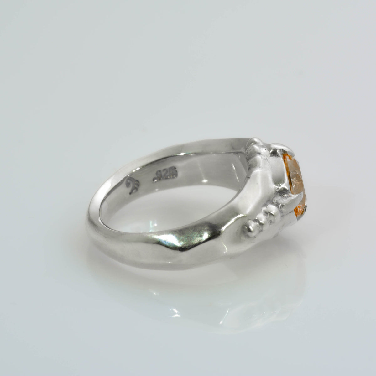 &quot;Organic Elegance: Handcrafted Silver Ring with Exquisite Carvings and Orange Topaz&quot; - Nine Amulets 