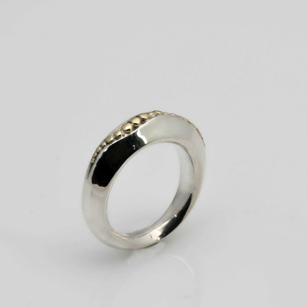 &quot;Golden Spheres: A Unique and Elegant Sterling Silver Ring with 14K Gold Accents&quot; - Nine Amulets 