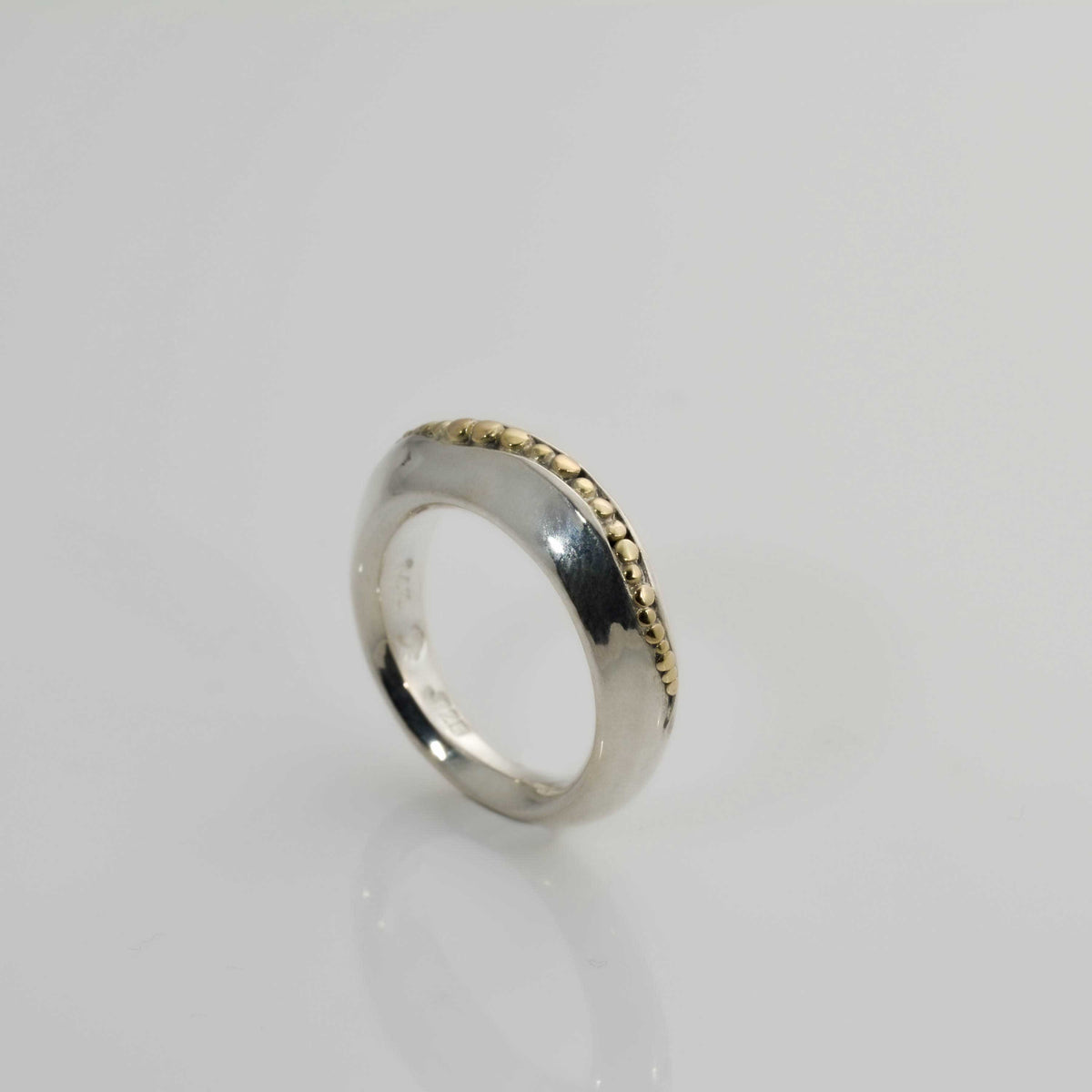 &quot;Golden Spheres: A Unique and Elegant Sterling Silver Ring with 14K Gold Accents&quot;