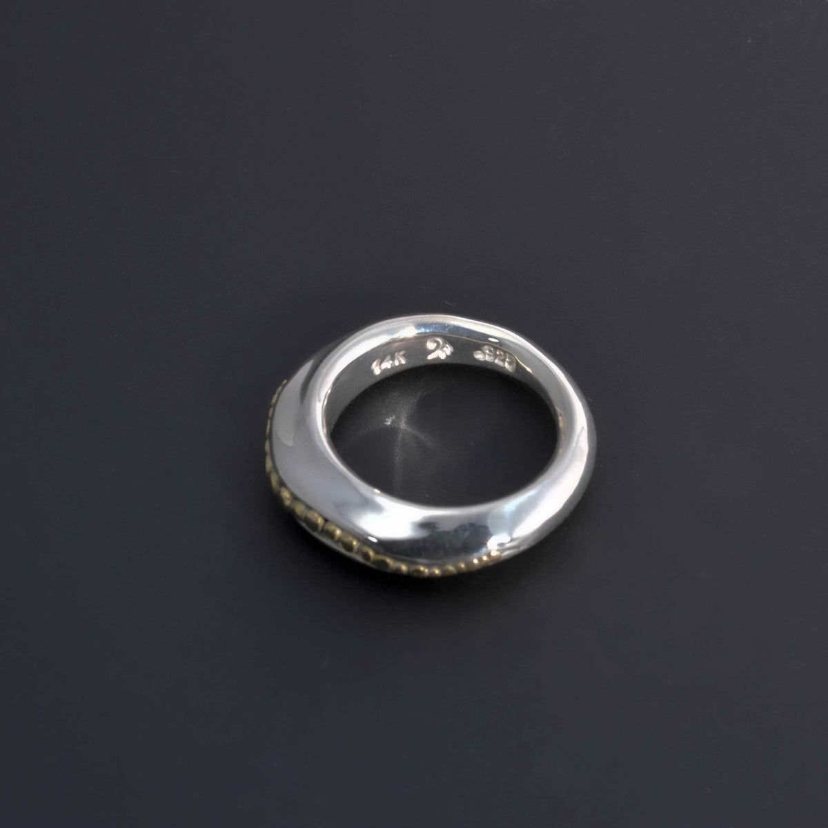 &quot;Golden Spheres: A Unique and Elegant Sterling Silver Ring with 14K Gold Accents&quot; - Nine Amulets 