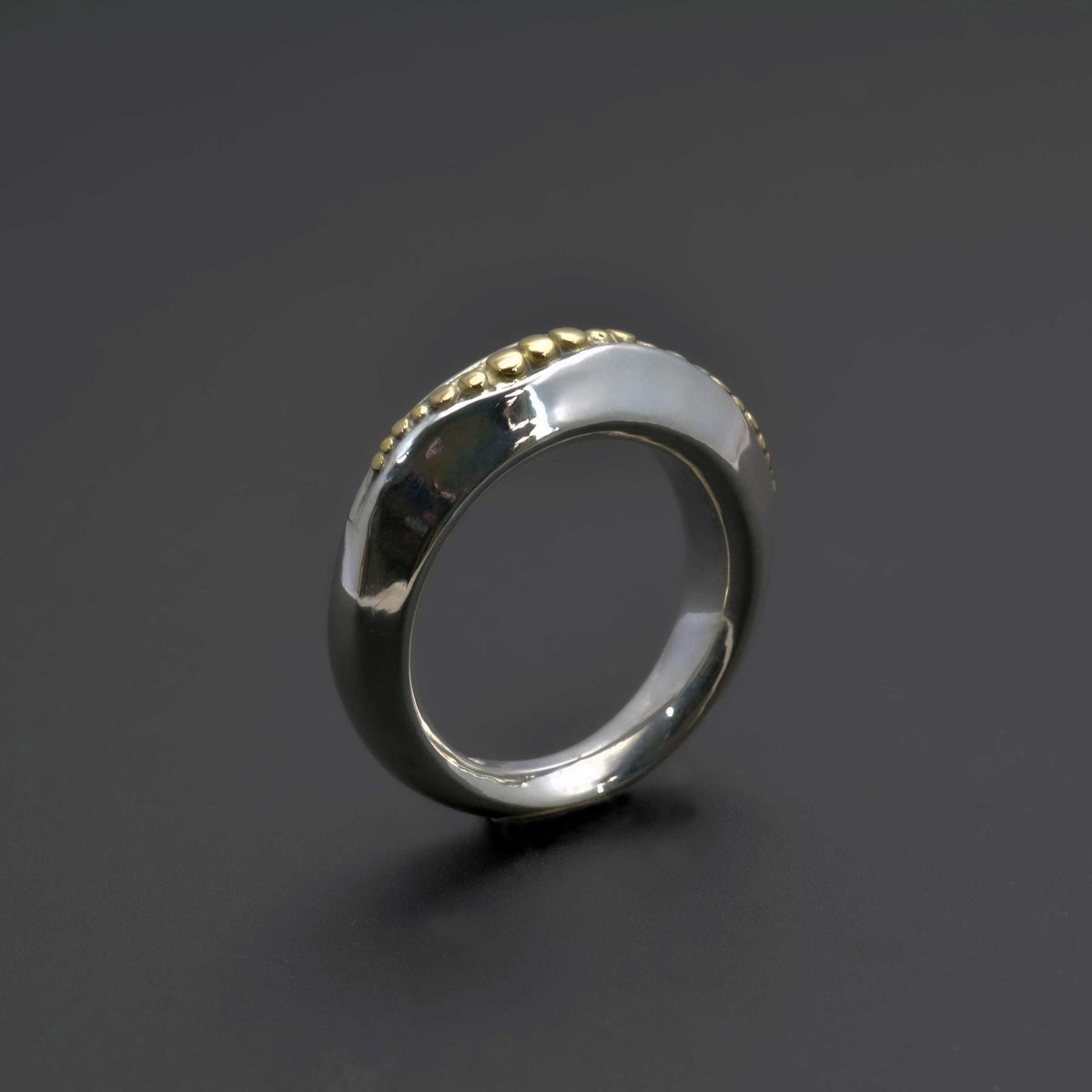 &quot;Golden Spheres: A Unique and Elegant Sterling Silver Ring with 14K Gold Accents&quot; - Nine Amulets 