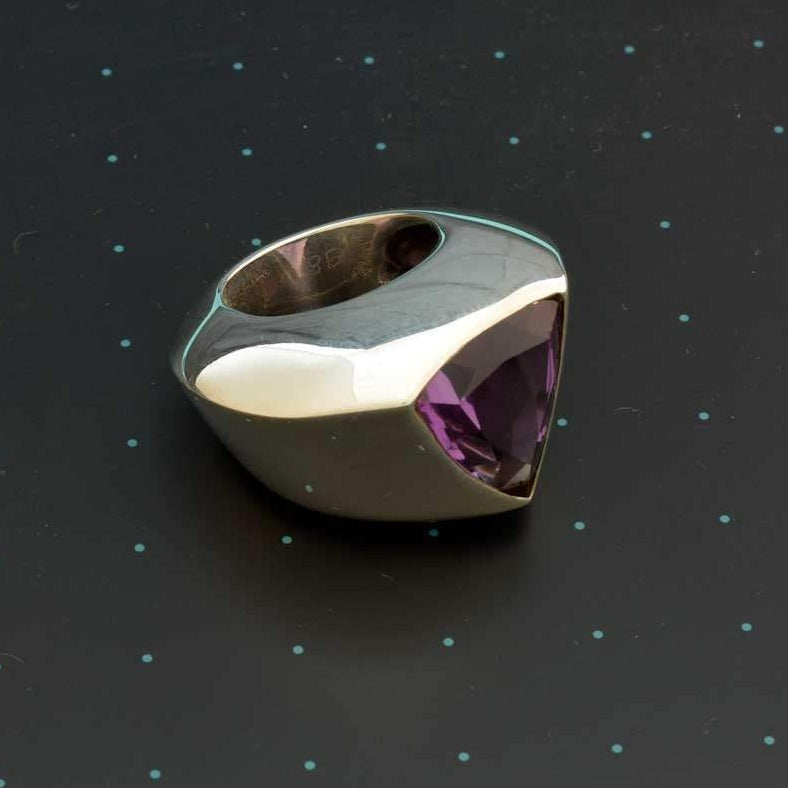 Massive triangular silver ring with amethyst