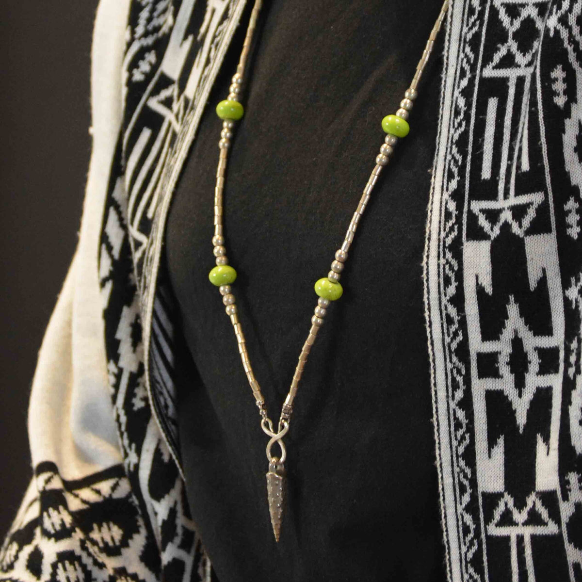 Pinole iron pendant with California green beads