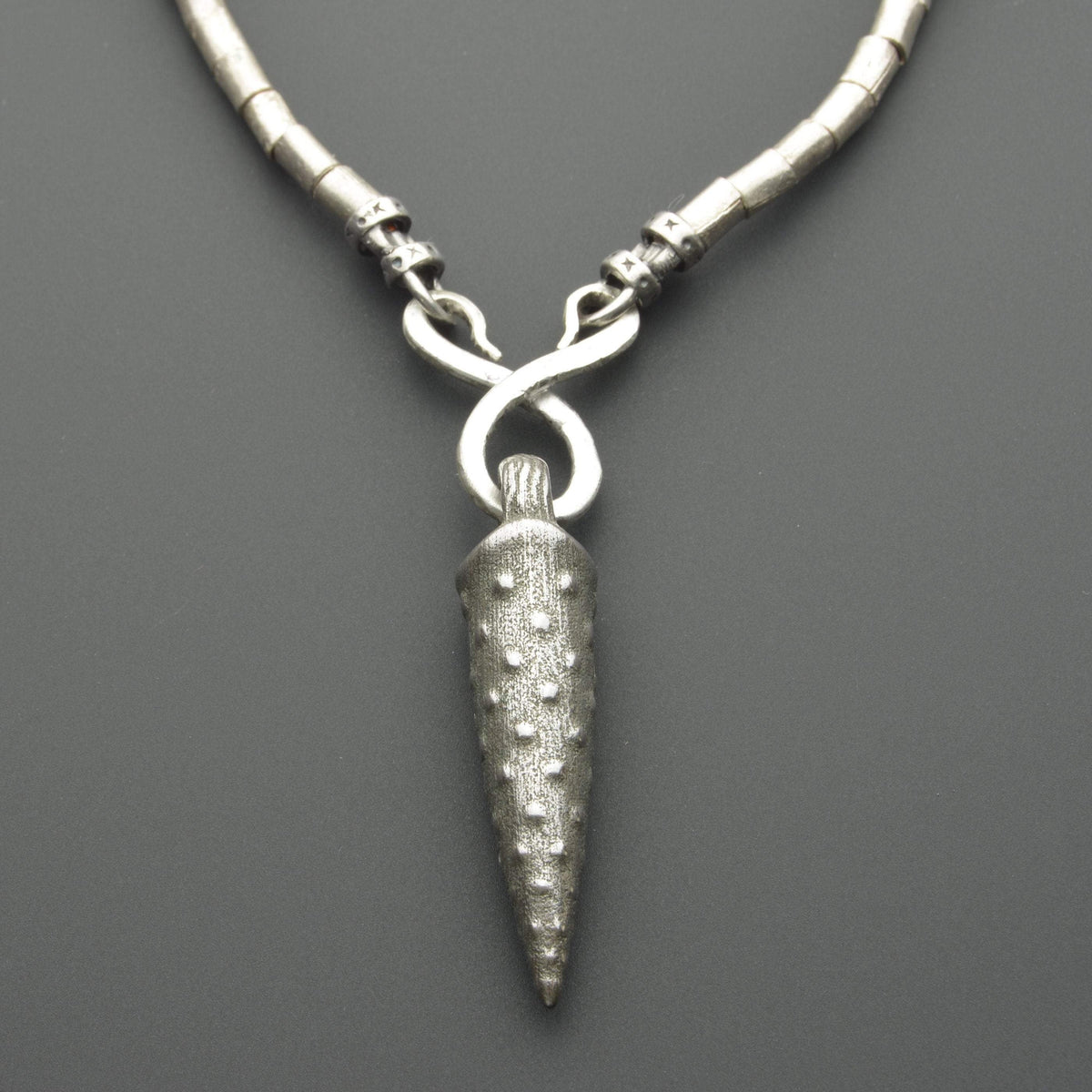 Iron bullet pendant with metal necklace