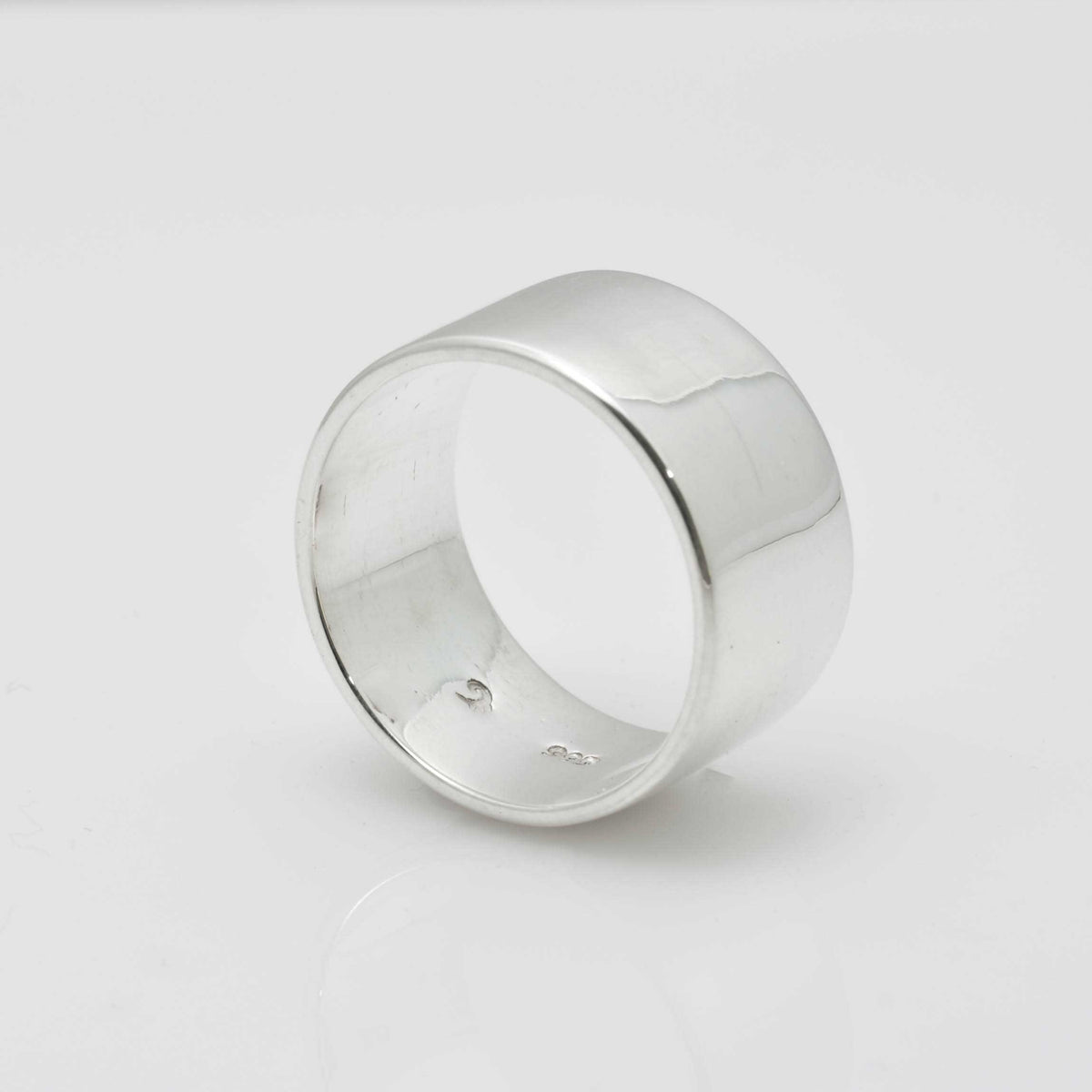 &quot;Echoes of Elegance: The Artisanal Sterling Silver Tube Ring - An Unparalleled Blend of Style, Substance, and Svelte Craftsmanship&quot; - Nine Amulets 