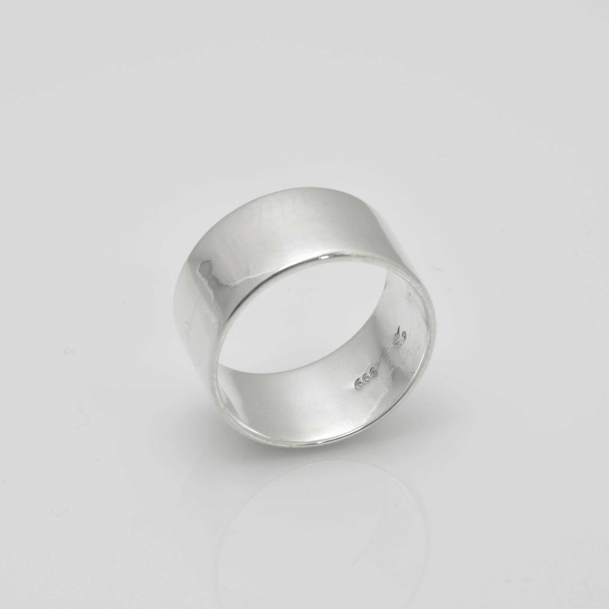 &quot;Echoes of Elegance: The Artisanal Sterling Silver Tube Ring - An Unparalleled Blend of Style, Substance, and Svelte Craftsmanship&quot; - Nine Amulets 