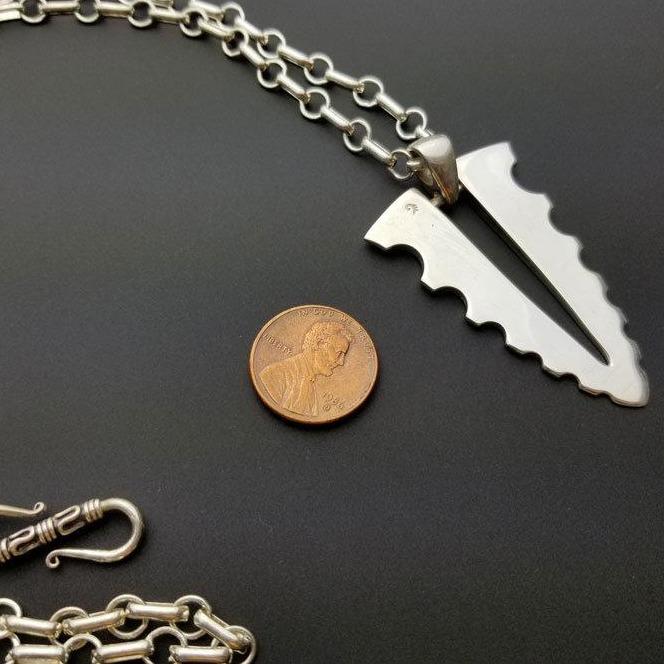 Large blade silver pendant