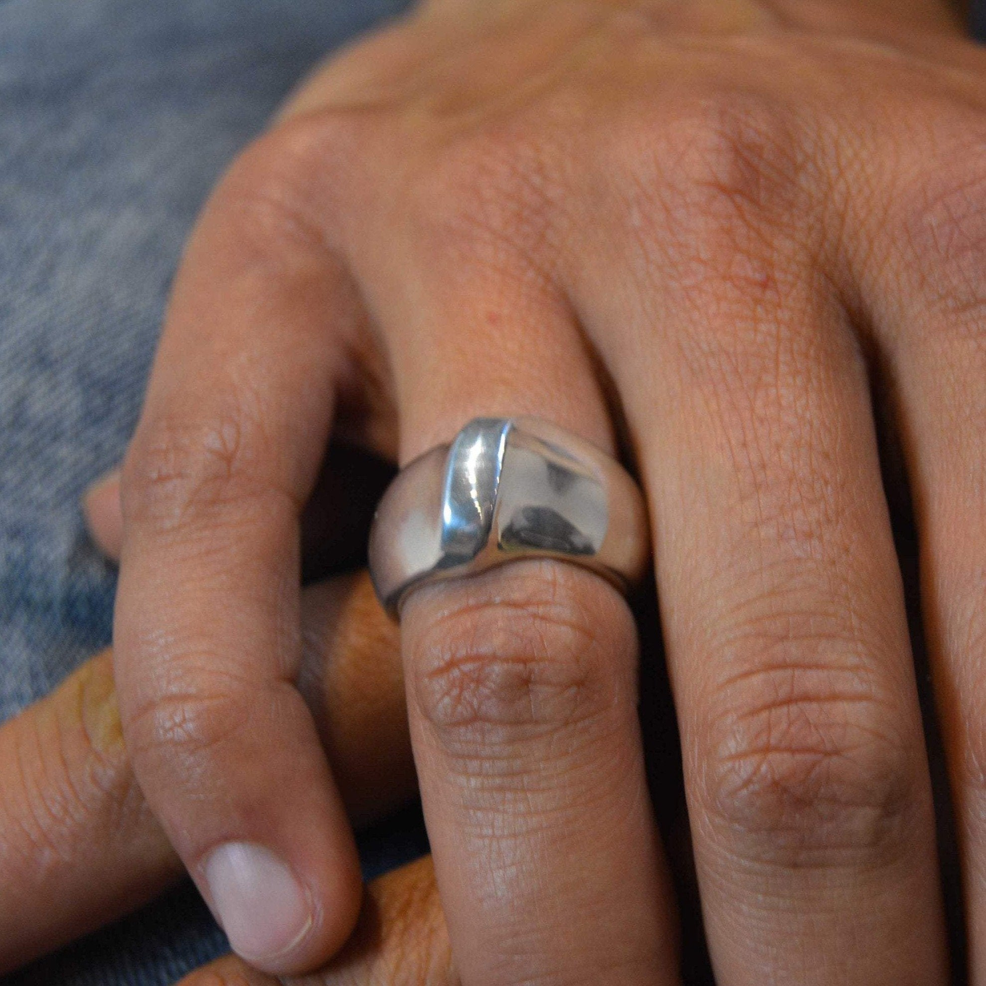 Large silver ring with unique form