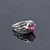 Make a Statement with an Art Nouveau Sculpture Ring Featuring a Round Pink Topaz - Nine Amulets 