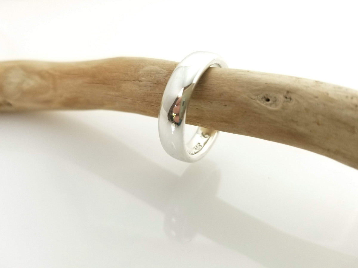 &quot;New Moon Ring, Timeless Elegance: The Classic Solid Silver Wedding Band&quot; - Nine Amulets 
