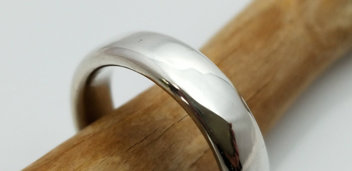 &quot;New Moon Ring, Timeless Elegance: The Classic Solid Silver Wedding Band&quot; - Nine Amulets 