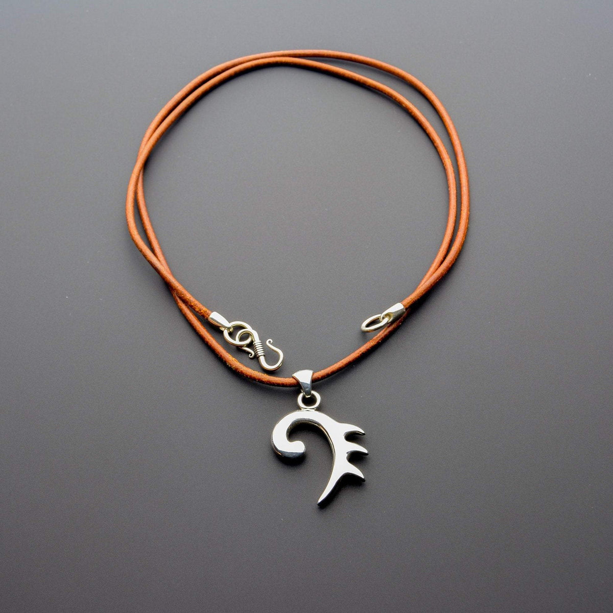 Cool designer pendant with Bali clasp and leather cord