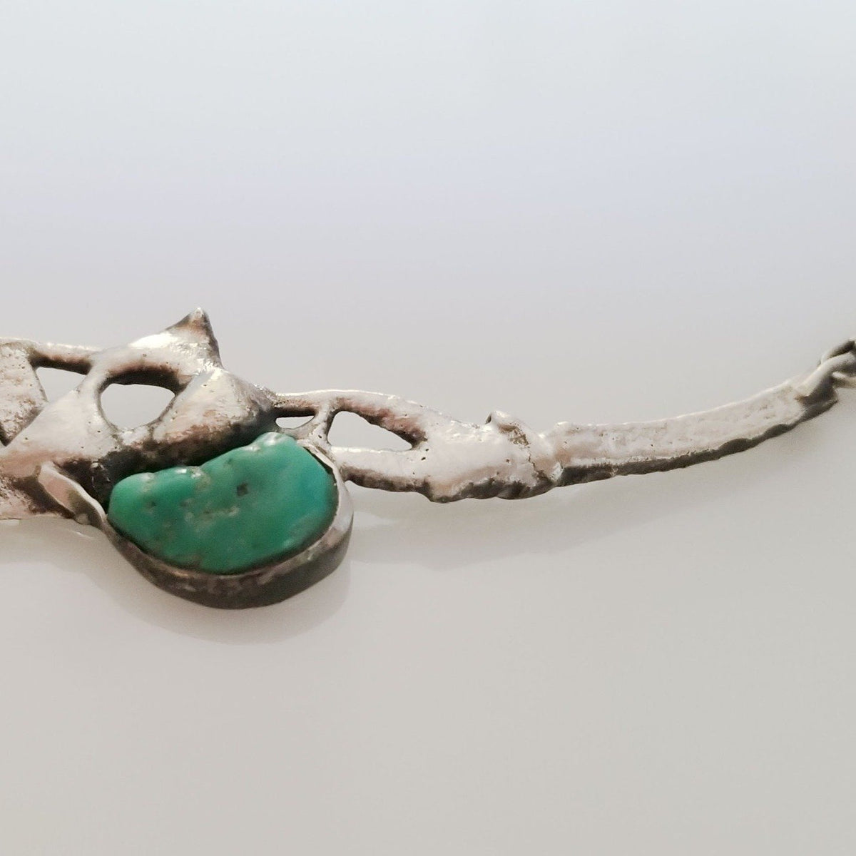 Natural jewelry with green turquoise melted silver
