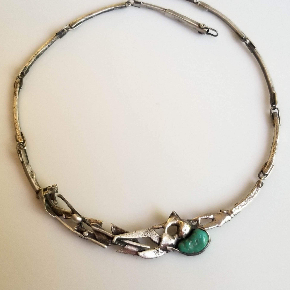 Unique melted silver choker with green turquoise 