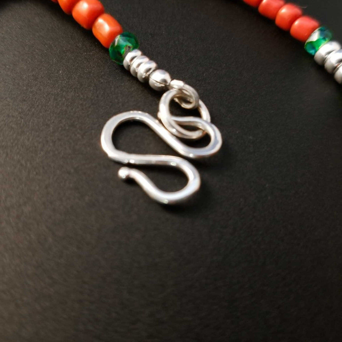 S hook silver clasp on red bead necklace