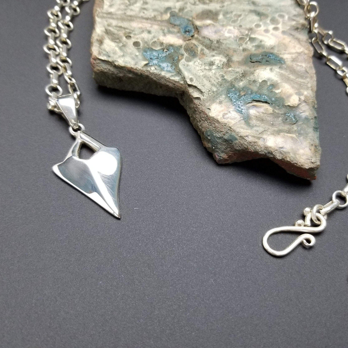 Large link sterling silver ring with shark tooth pendant
