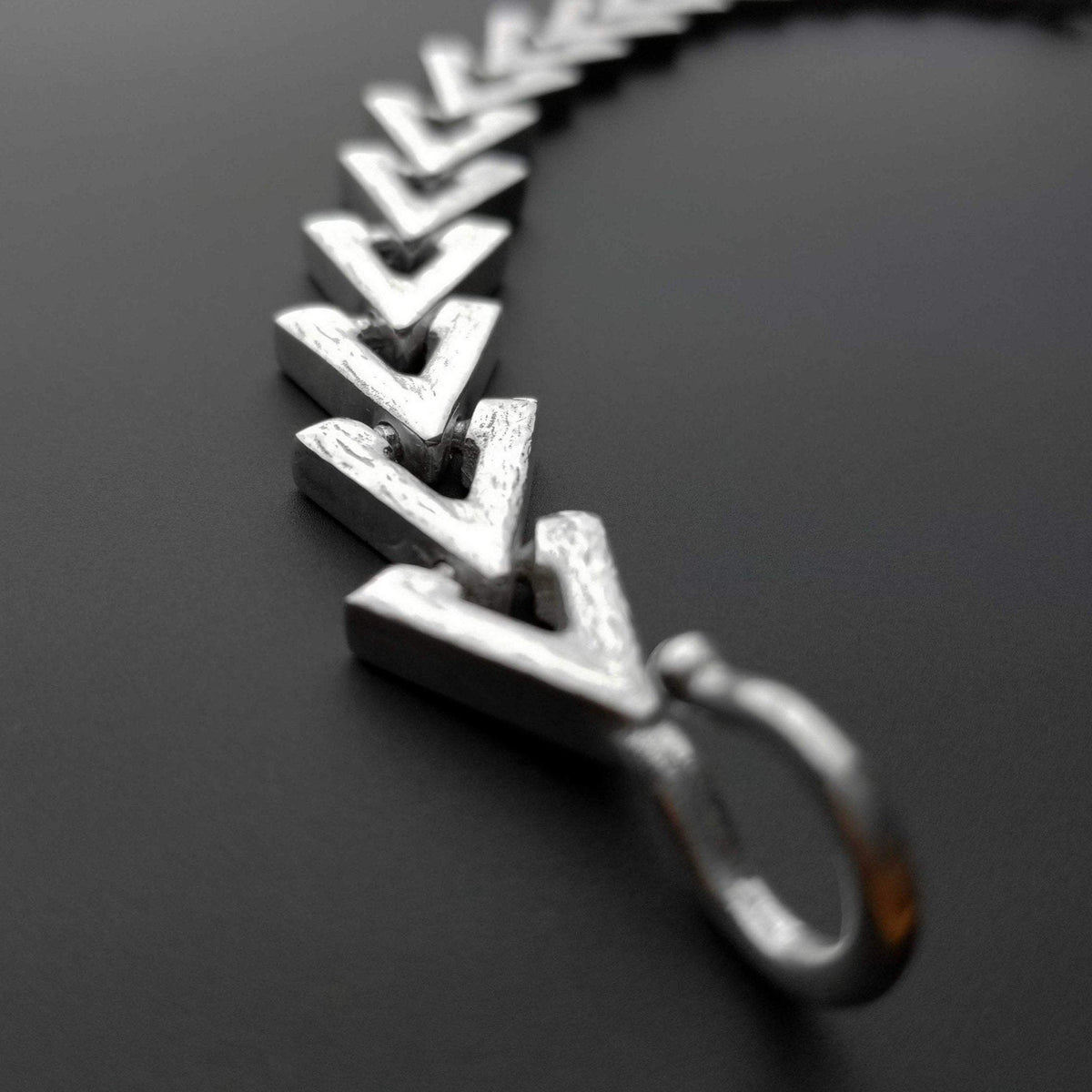 Loop hook for triangular silver bracelet