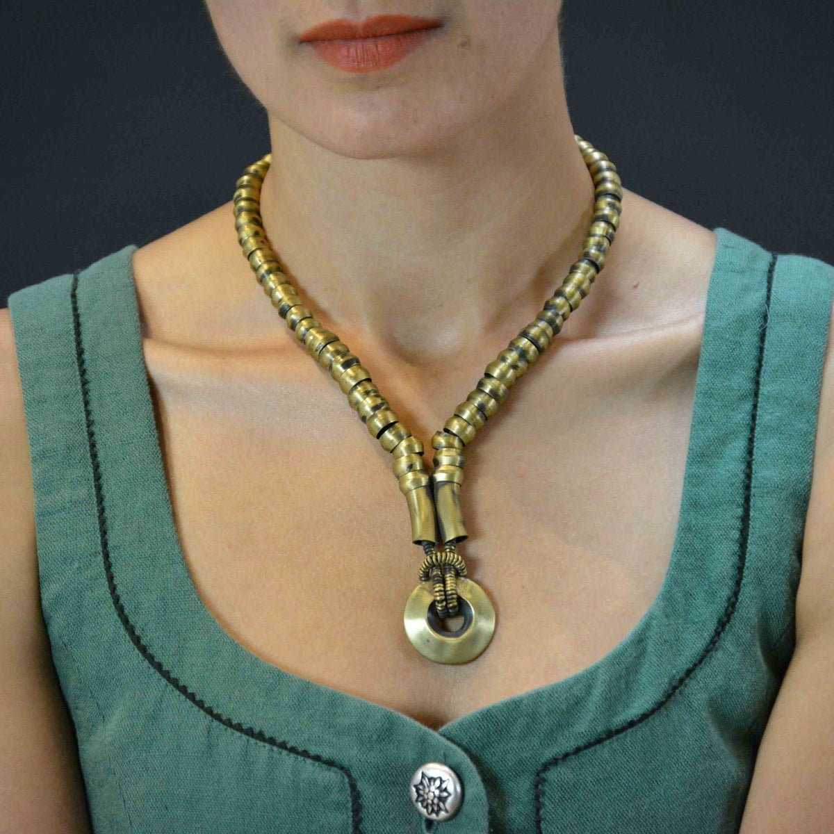 Tiger brass color disk necklace