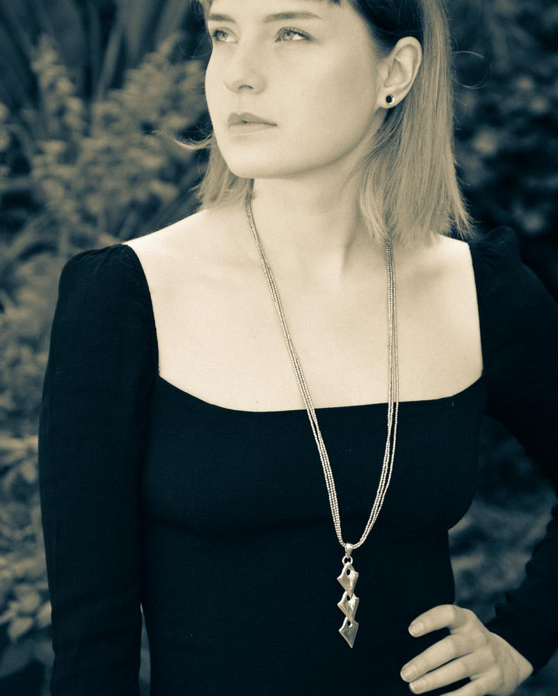 Unleash Your Inner Warrior with our Silver Arrowhead Triple Pendant Tribal Charm Necklace - Nine Amulets 