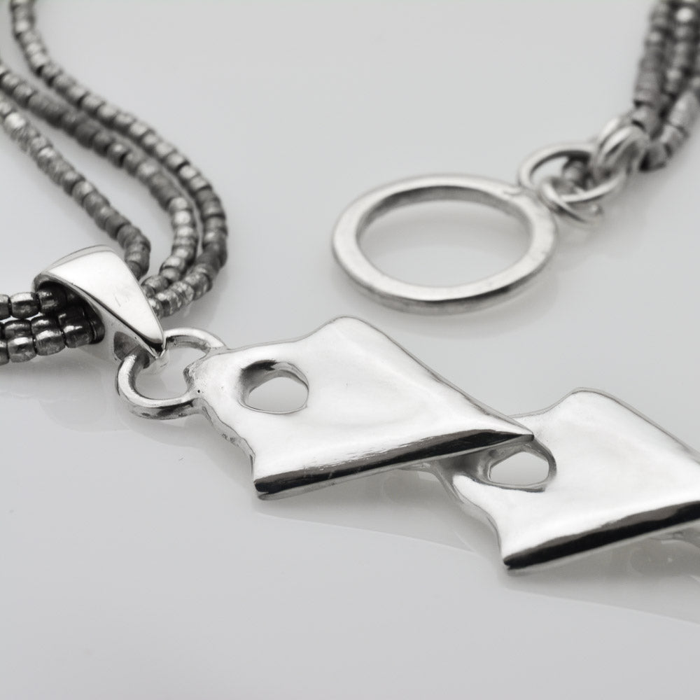 Unleash Your Inner Warrior with our Silver Arrowhead Triple Pendant Tribal Charm Necklace - Nine Amulets 