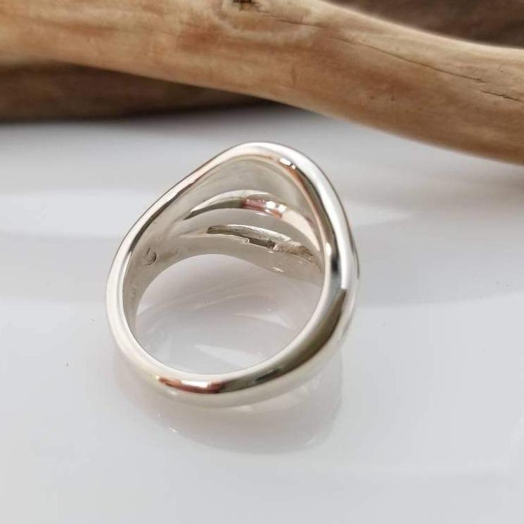Dome sterling silver ring with three ridges on shank
