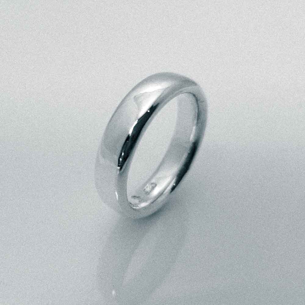 &quot;New Moon Ring, Timeless Elegance: The Classic Solid Silver Wedding Band&quot; - Nine Amulets 