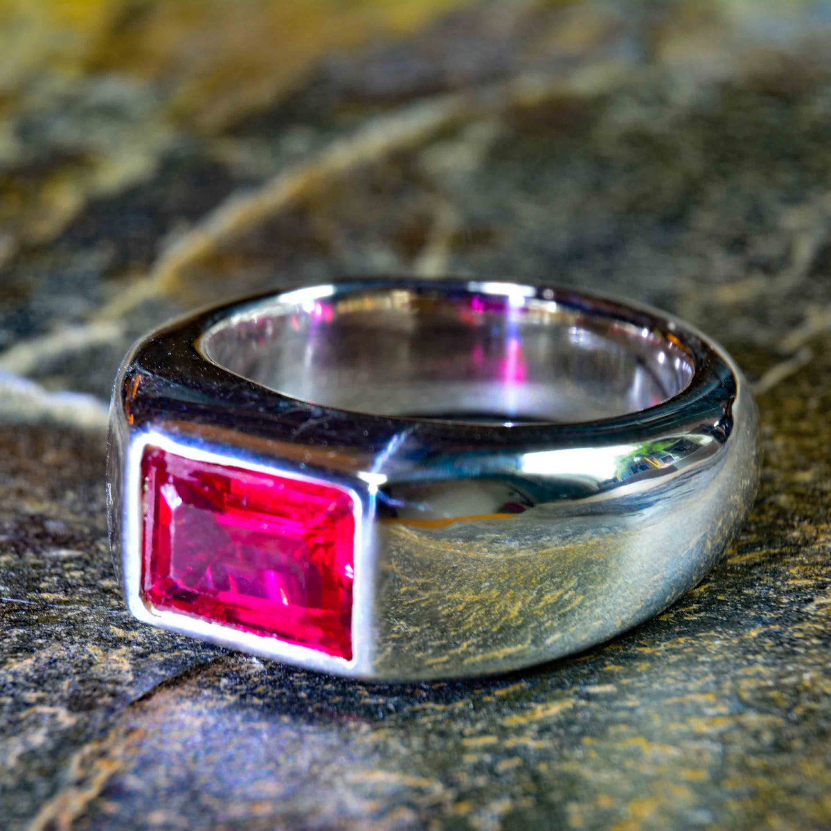 Ruby Silver Ring is a Thick and Bold Silver with a Beautiful Bright Ruby on Top