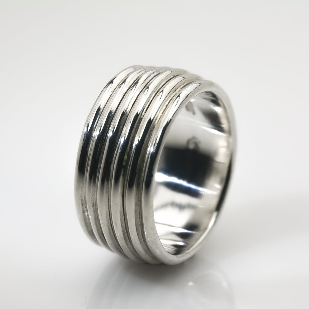 Revolutions: A Bold and Elegant Sterling Silver Ring with Six Loops - Nine Amulets 