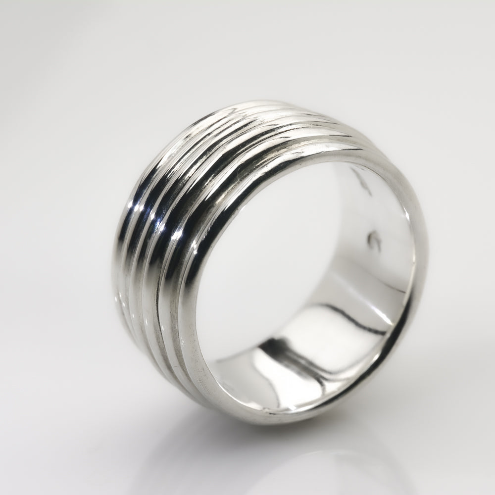 Revolutions: A Bold and Elegant Sterling Silver Ring with Six Loops - Nine Amulets 
