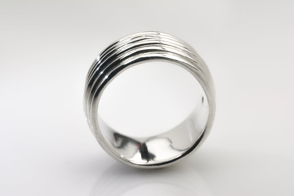 Revolutions: A Bold and Elegant Sterling Silver Ring with Six Loops - Nine Amulets 