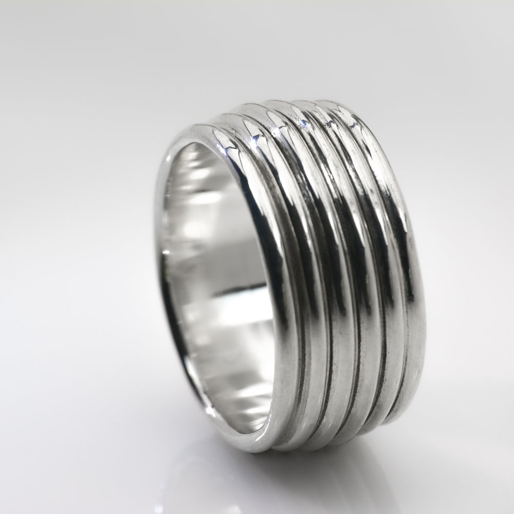 Revolutions: A Bold and Elegant Sterling Silver Ring with Six Loops - Nine Amulets 