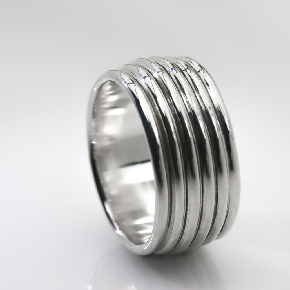 Revolutions: A Bold and Elegant Sterling Silver Ring with Six Loops