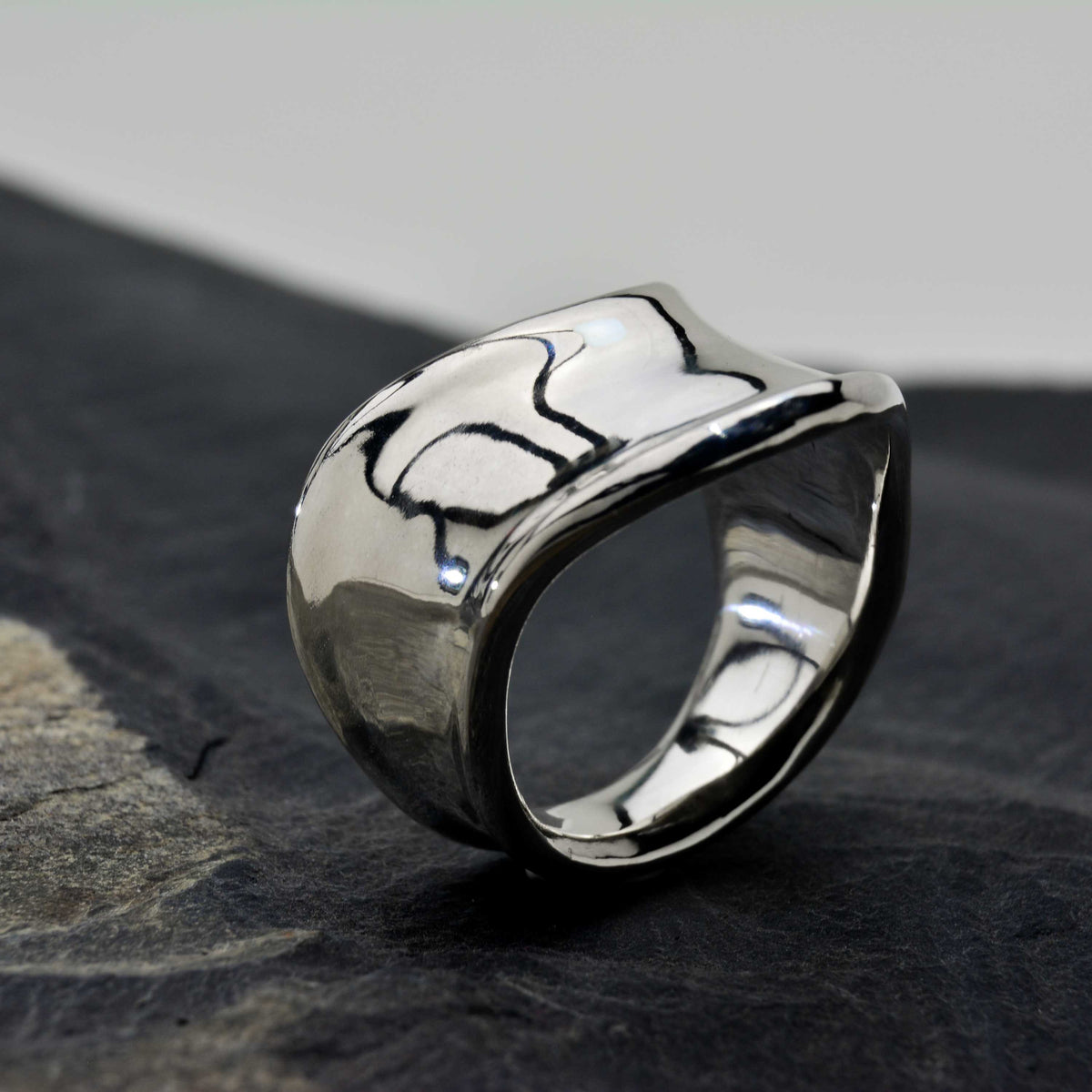 Evolution Ring Bold Beauty: A Thick and Artistic Ring with a Stunning Design